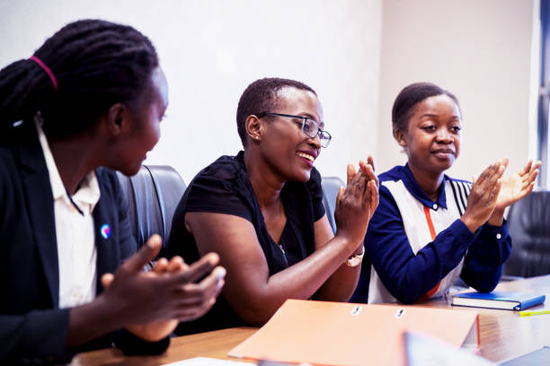 istockphoto-1150747905-612×612 Women Empowerment, Africa, Corporate Business - Group of Female Business Executives applauding the team work and achievements